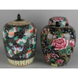 Two large old Chinese porcelain Family Noir lid pots with various decors (fruit; floral). 20th