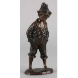 Ancient bronze figure, farmers boy with hands in his pocket. By Julius Paul Schmidt-Felling, 1835-