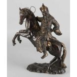 Ancient Chinese bronze figure with rest conviction. 20th century. 'Scaffolding horse with emperor'.