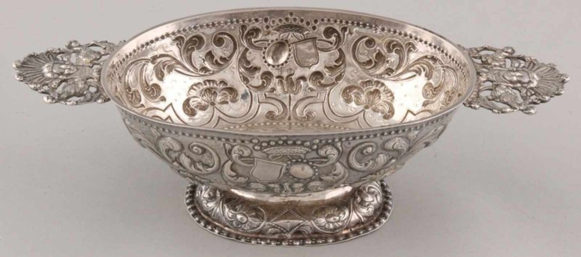 Antique silver brandy bowl, decorated with acanthus leaves, curls, shields and cartouches. The