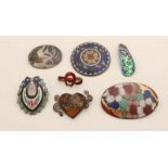 Lot with seven brooches, among others, with enamel.