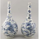 Two Chinese porcelain pipe vases with dragons and bird of paradise decors (labeled). 18th - 19th