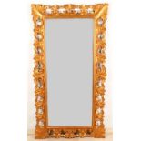 Large gold-colored Italian-style mirror with open wood frame. About 1980. Dimensions: 151 x 80 cm.