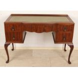 English mahogany Queen Anne style writing table with five drawers. About 1920. Recently