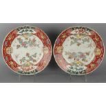 Two antique (marked) Japanese Imari porcelain decorative plates with floral decors. Around: 1900.