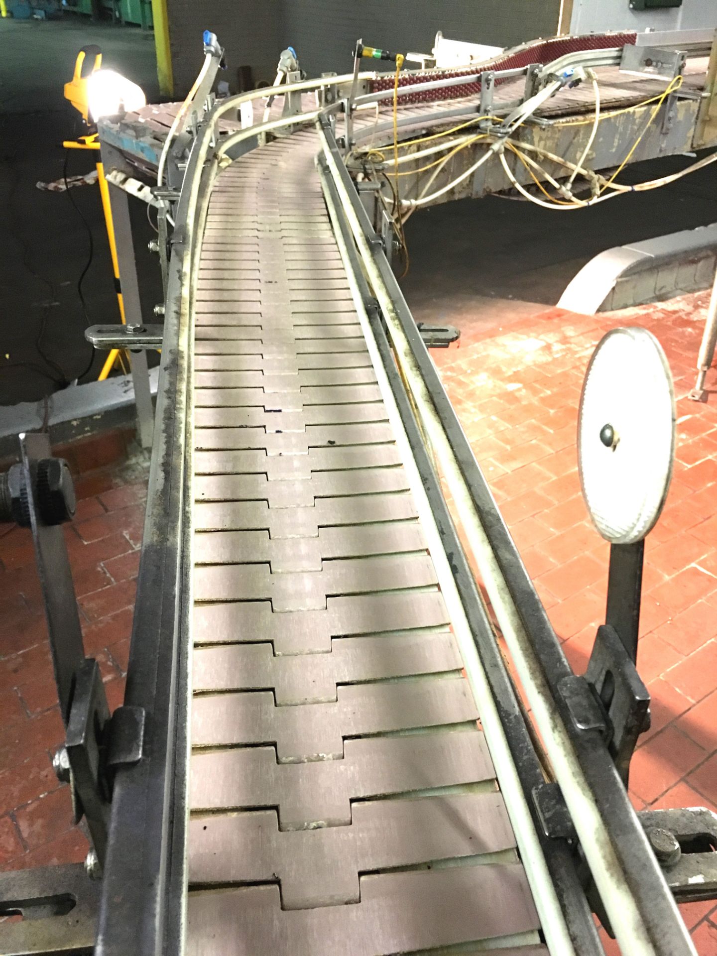 Bottle Conveyor 7.5 Inch Chain, Approximately 18ft with a 45 degree Curve with Drive - Feeds into 15