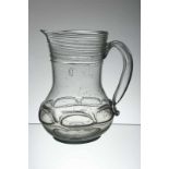 A large baroque glass pitcher Bohemia, 18th century, clear glass pitcher, pear-shaped spout and