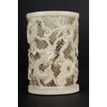 Ivory tumbler for brushes China, apparently Canton, 19th century, decorated with a motif of