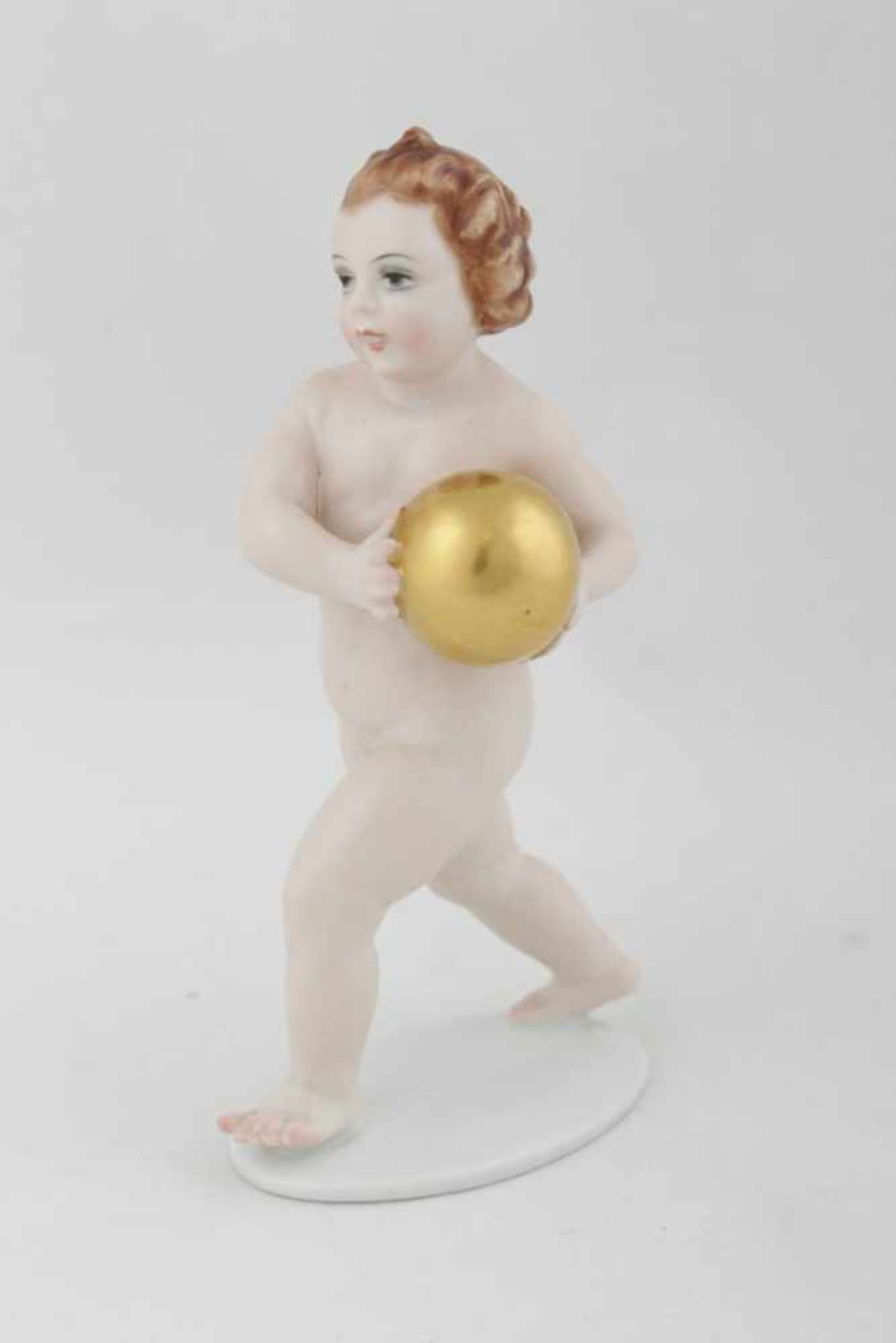 Rosenthal – putto with a golden ball Germany, middle of the 20th century, design Hugo Meisel,