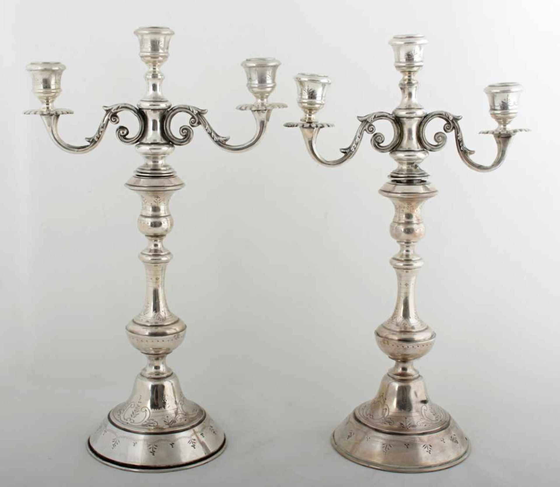 A pair of silver candlesticks Austria-Hungary, turn of the 19th and 20th centuries, pair of three