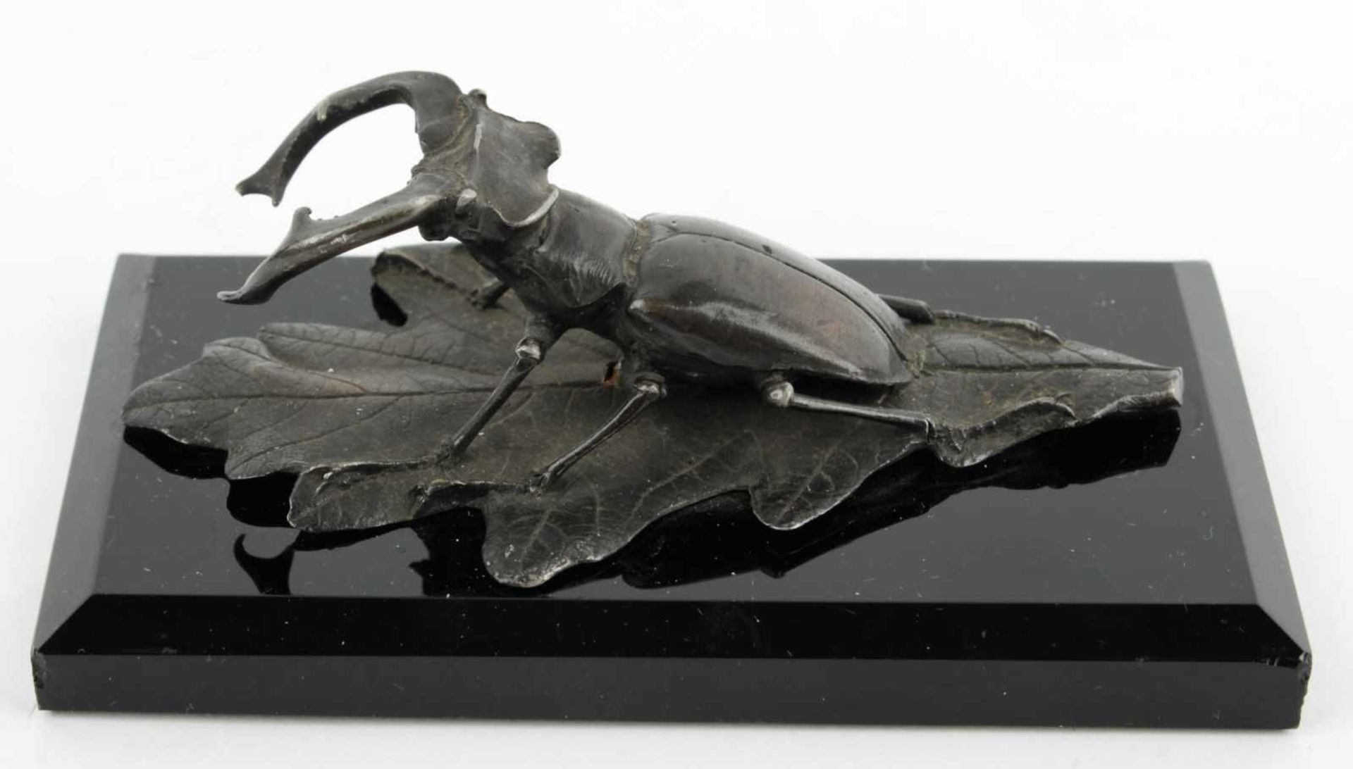 Sculpture of the stag beetle 1st half of the 20th century, pewter composition, patinated, red