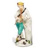 HIRTE MIT HUND. Meissen. 18. Jh. Porzellan, farbig und gold staffiert. Höhe 16 cm. Ohne erkennbare