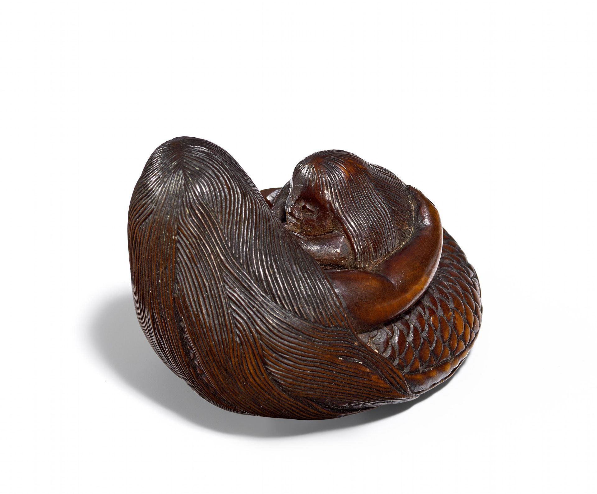 NETSUKE: NINGYÔ STILLEND. Japan. Edo-Zeit. Spätes 18. Jh. Buchsbaum, sehr fein geschnitzt, - Bild 2 aus 3