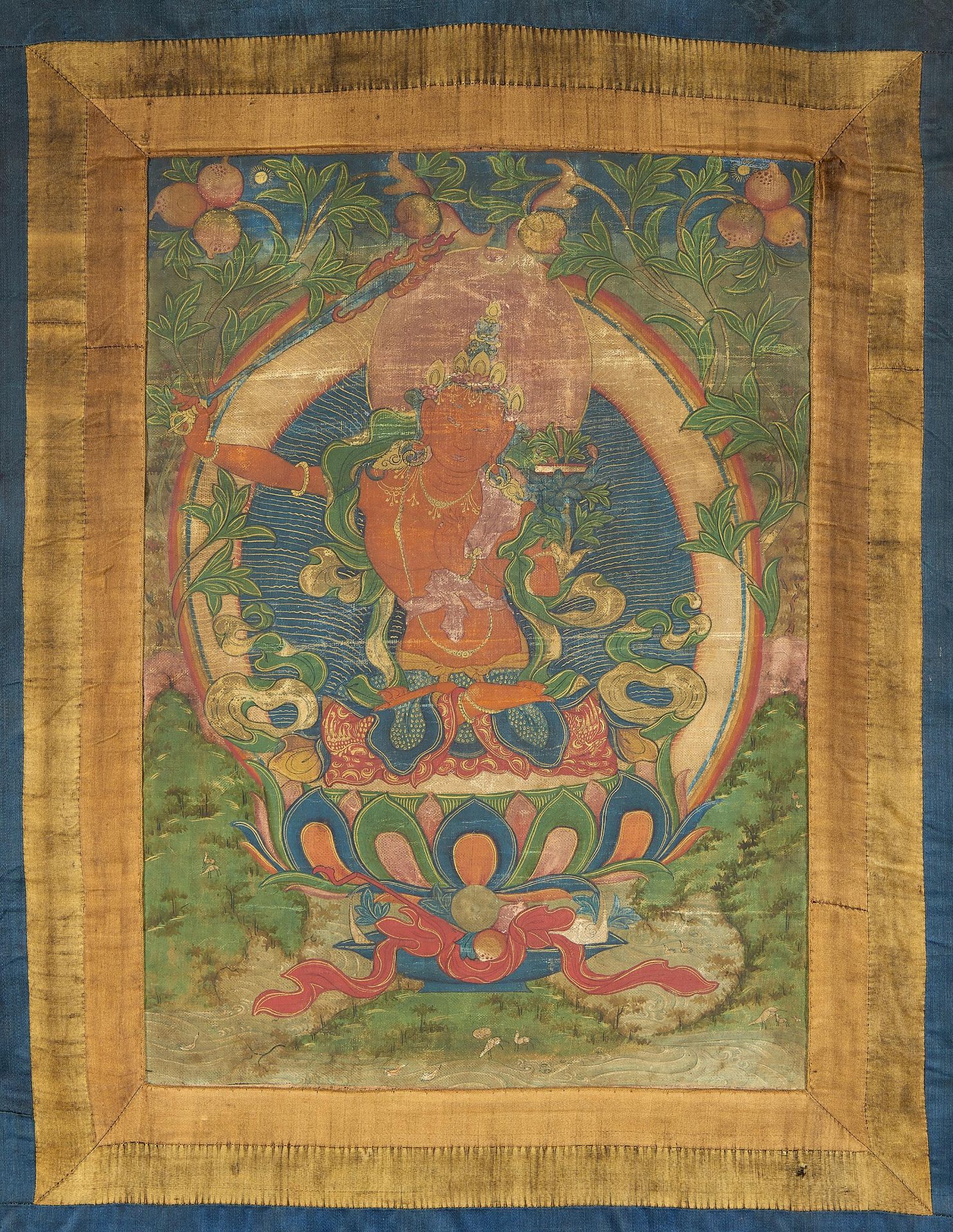 THANGKA DES MANJUSRI. Tibet. Ca. 18./19. Jh. Farben und Blattgold auf Gewebe. Mit Seide als