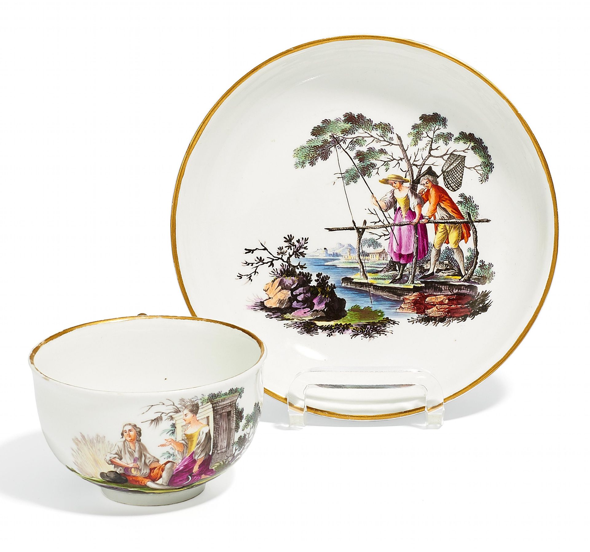 TASSE UND UNTERTASSE MIT LÄNDLICHEN SZENEN. Fulda. 1764 - ca. 1775. Porzellan, farbig dekoriert.