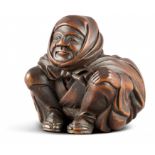 NETSUKE: YAKUHARAI. Japan. Edo-Zeit. Buchsbaum mit fein geschnitzten Details. Die Augen des Jägers