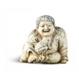 NETSUKE: SENNIN GAMA. Japan. Edo-Zeit. 18. Jh. Jugendlicher Sennin Gama, fröhlich lachend über die