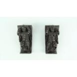2 kleine palissander snijwerktjes putti, 17e eeuw stel gestoken palissander ornamenten met