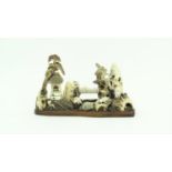 Chinese sculptuur met konijntjes Chinese gestoken ivoren sculptuur met voorstelling van