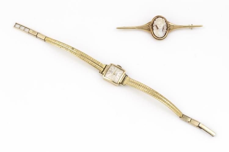 double horloge en broche dameshorloge met vierkante wijzerplaat in 14 krt. gouden montuur en