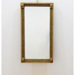 schouwspiegel schouwspiegeltje met geprofileerde lijst en in de hoeken versierd met ovalen, 19e