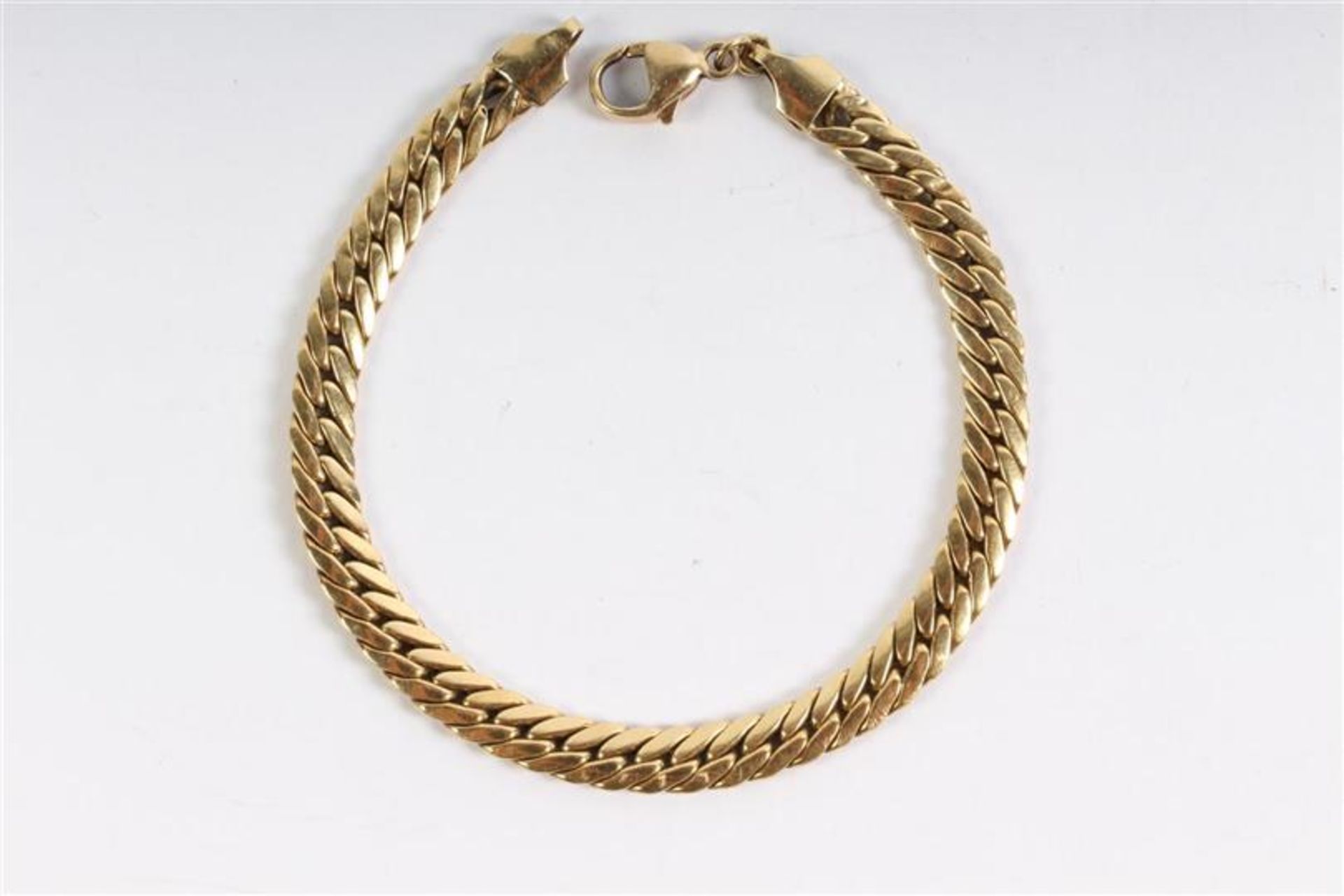 Gouden schakelarmband. Gewicht: 7.2 g.