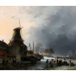 Cornelis Gerrit Verburgh (1802-1879) Winter scene with skaters near a windmill. Signed and dated
