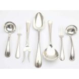 A seven piece silver serving service. By amongst others Fa. J.M. van Kempen & Zonen, Voorschoten.