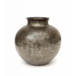 Jan Kriege (1884-1944) A hammered pewter vase, circa 1930, signed underneath J. Kriege. 26 cm. h.