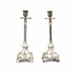 Jugendstil A pair of silvered pewter candlesticks, decorated with stylised natural pattern, circa