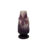 Emile Gallé (1846-1904) A cameo etched glass vase with purple floral pattern on a clear ground,