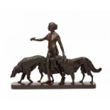 Arthur Bock (1875-1957) A dark brown patinated bronze sculpture depicting Diana with two dogs (