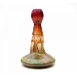 Jugendstil A red and green lustre glass vase with twisted neck, circa 1900, small chips to inside