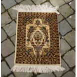 Silk carpet, dim. 49 x 36,5 cm. 27.00 % buyer's premium on the hammer price, VAT included