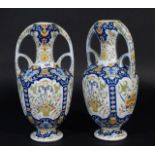 Two French earthenware vases, early 20th century, 1 vase restored, h. 32 cm. (2x) 27.00 % buyer's