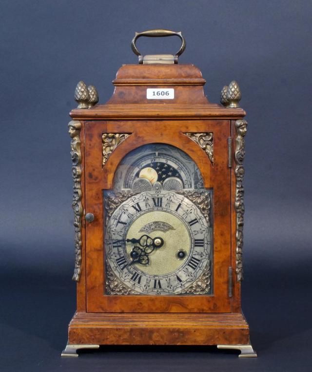 English table clock, John Taylor London, 19th/20th century, h. 42 cm. 27.00 % buyer's premium on