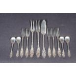 12 Dutch silver moccha spoons, 12 cake forks and 2 pickle forks and butter knife, second amount,