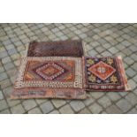 Two pillow and a Persian carpet, dim. 75 x 43 cm (3x) 27.00 % buyer's premium on the hammer price,