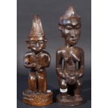 Two wooden African sculptures, Man and woman, h. 35 and 40 cm., Provenance: Collection van