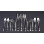 12 Dutch silver petitfour forks, 12 moccha spoons and 12 pickle forks, second amount, appr. 309