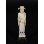 Japanese ivory okimono, on wooden base, Sholar, h. 10 cm. 27.00 % buyer's premium on the hammer