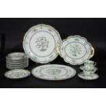 Haviland Limoges service, consisting of: 2 cups and 4 saucers, 12 breakfast plates, 2 cake dishes