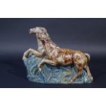 Glazed earthenware sculpture, Two horses, signed 'Inicui', dim. 29 x 40 cm. 27.00 % buyer's premium