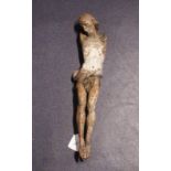 Polychrome wooden corpus, 18th century, arms are missing, l. 46 cm. 27.00 % buyer's premium on the