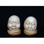 Two ivory Japanese heads, h. 3 cm (2x) 27.00 % buyer's premium on the hammer price, VAT included