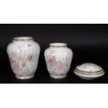 Porcelain Limoges vase, h. 14 cm and lidded dish, diam. 14 cm + Limoges vase, h. 18 cm. (3x) 27.