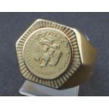 Yellow gold ring, 14 krt., with coin of Mexico, appr. 8.8 grams, ring size 19 27.00 % buyer's