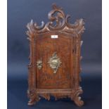 Oak wall cabinet, decorated with C-motifs, 18th century, interior of later date, dim. 56 x 33 cm.