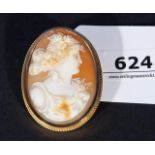 Cameo mounted in yellow gold, 14 krt., to be used as pin or as pendant, l. 4,5 cm. 27.00 % buyer's