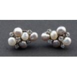 White gold earrings, 14 krt., set with pearls and zircons and brilliant cut diamonds 27.00 % buyer'